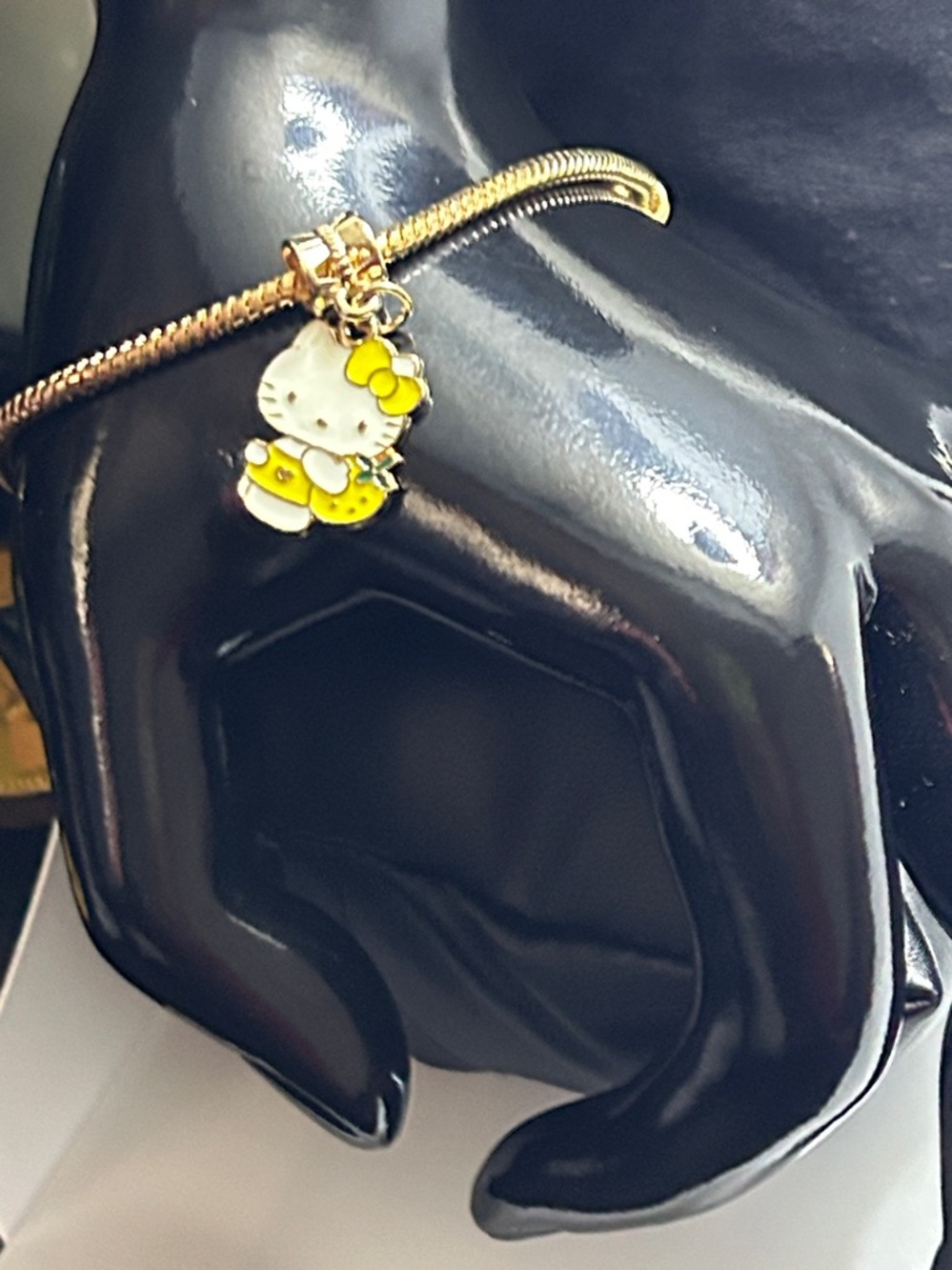 Hello Kitty Gold Tone Bracelet with White and Yellow Enamel Charm